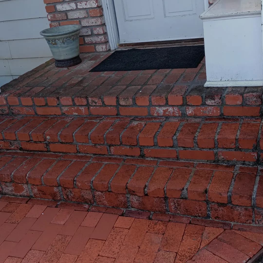 Basketweave paver patio pattern with decorative border