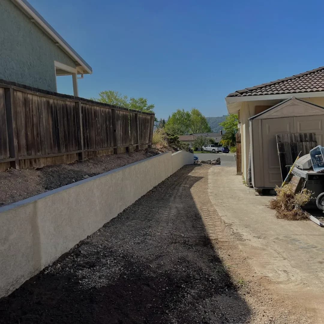 Retaining wall with paver integration