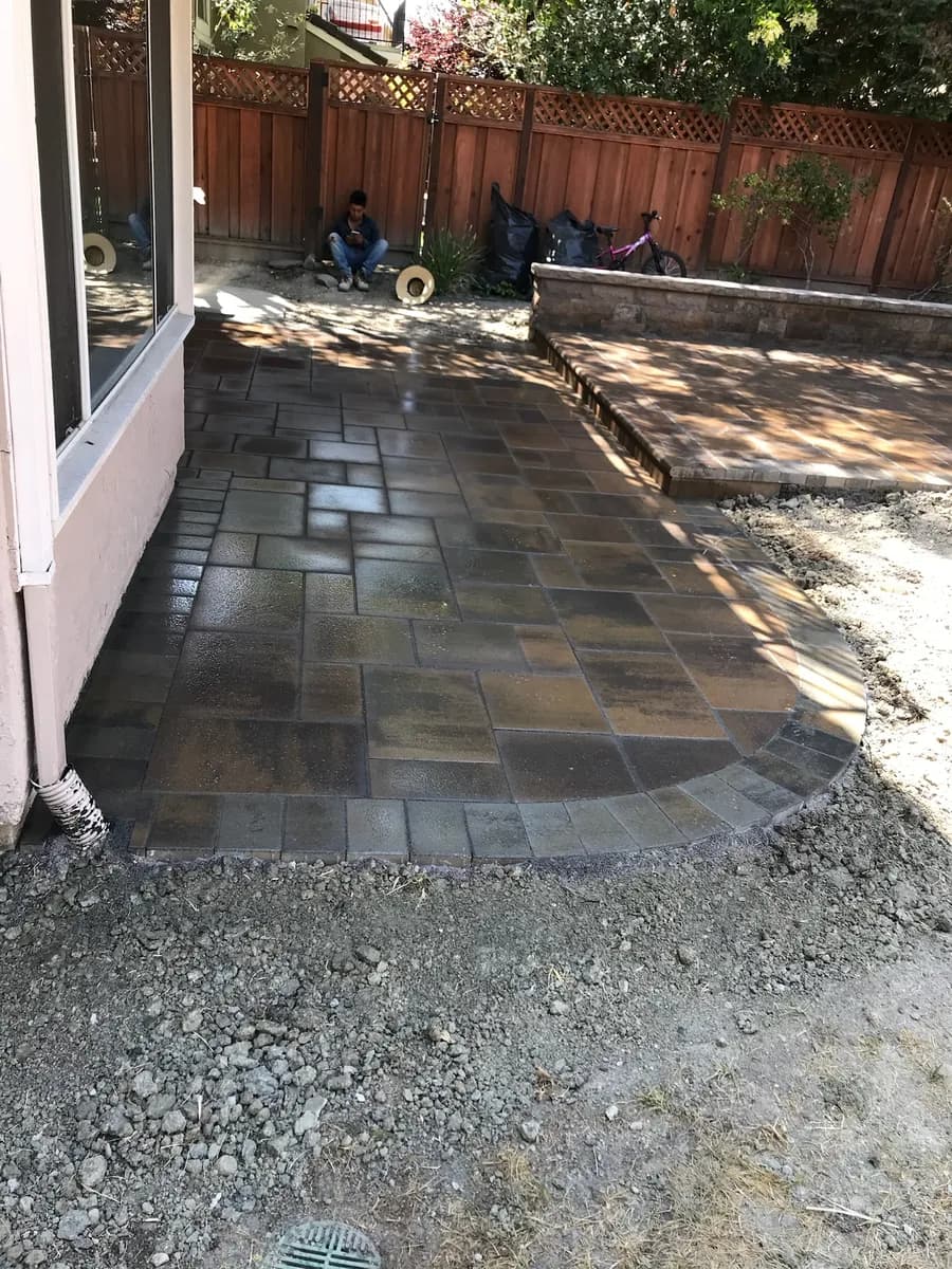 Custom paver patio with seatwall